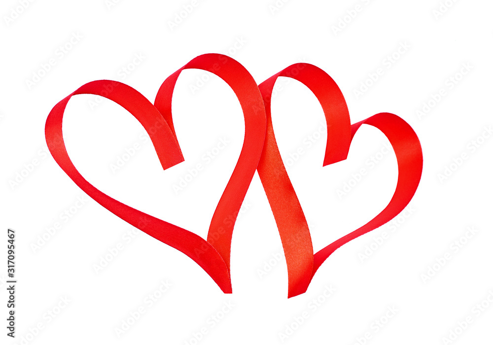 Shape of two united hearts made of red satin ribbon isolated on white.