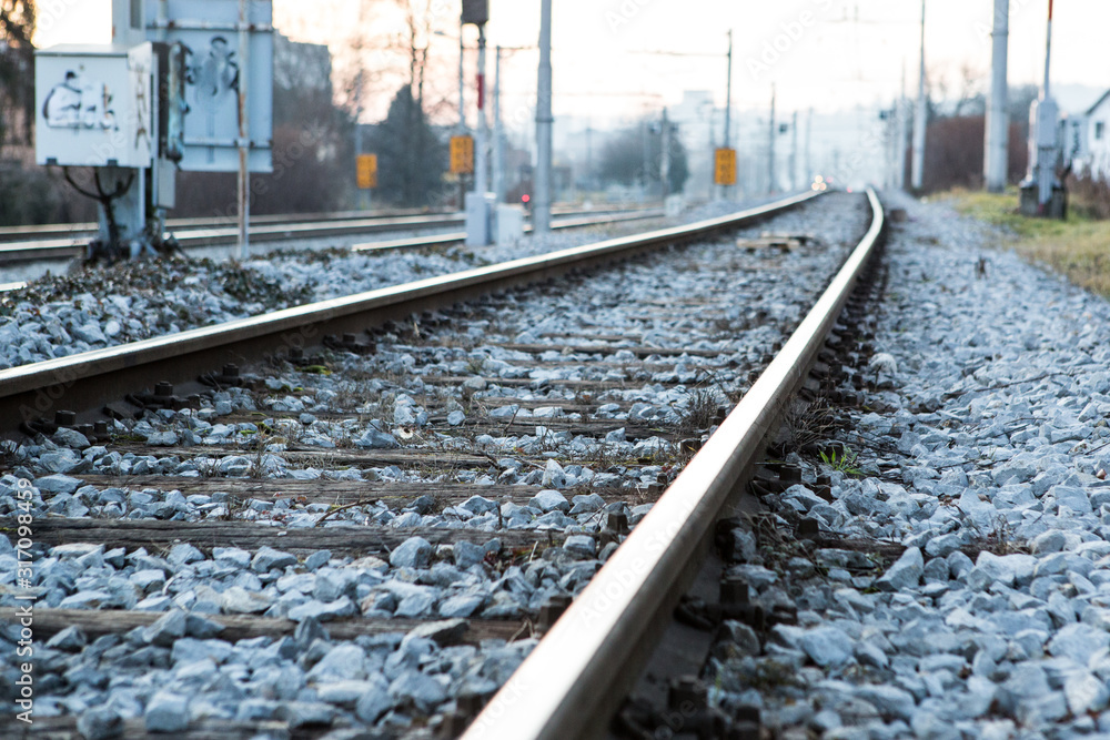 Fototapeta premium Railroad at the evening dusk somewhere rural