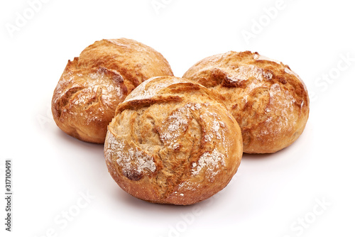 Foto Freshly baked round bread loaf, isolated on white background