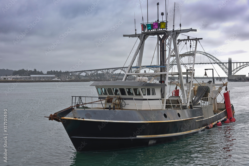 Fishing vessel returning to port Newport OR.