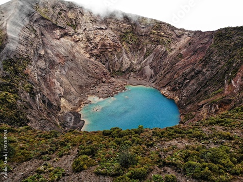 Volcano Irazú (Irazu) from above with a beautiful blue lake in the Volcano crater, Costa Rica photo