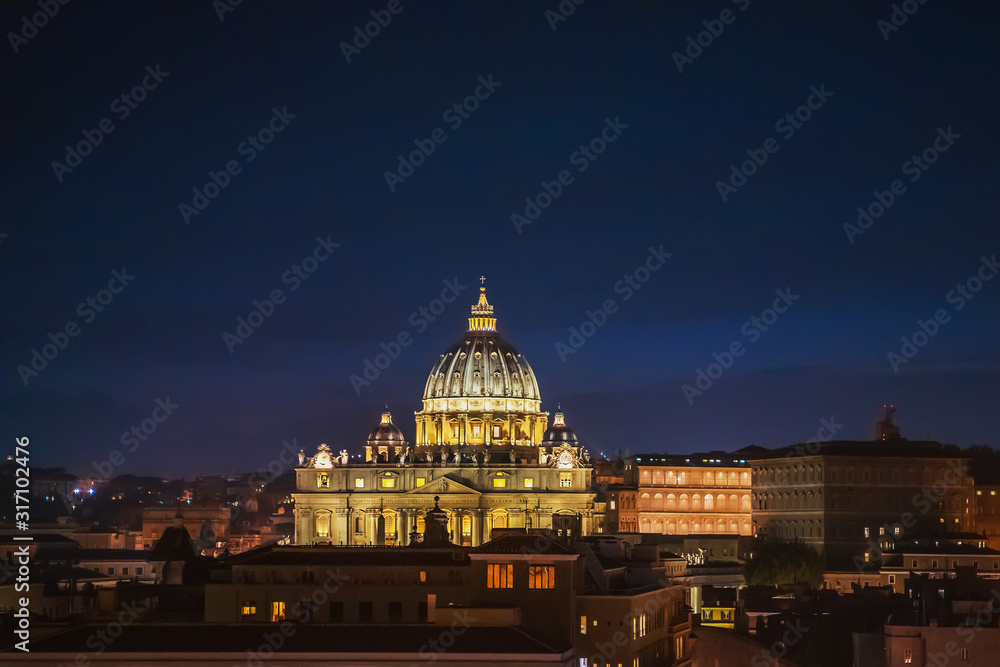 St Peters Basilica at night panorama from above. Rome, Italy.