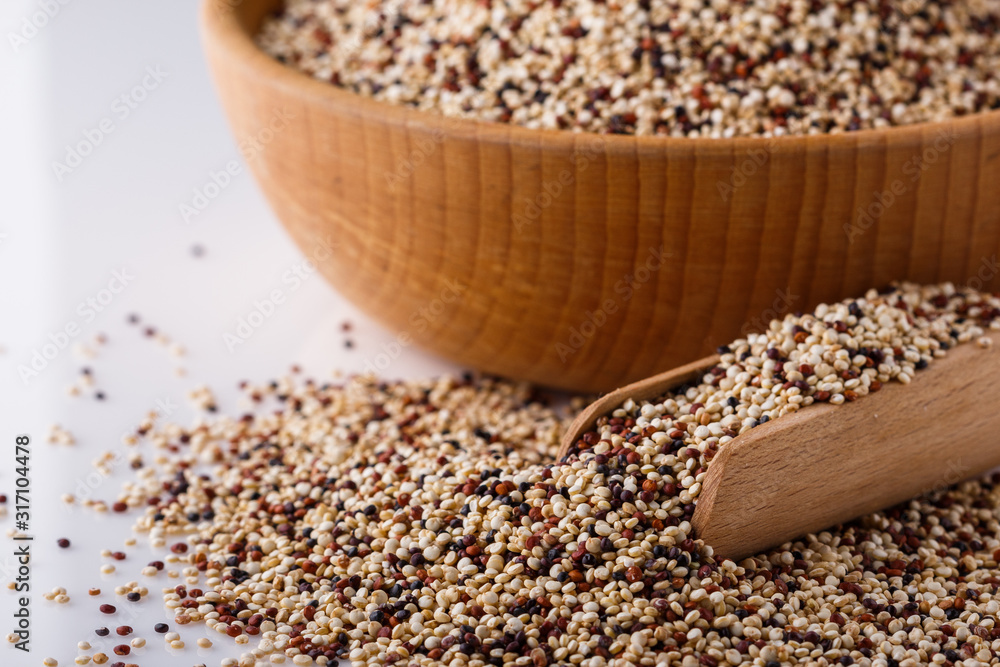 mix of quinoa grains on white acrylic background mix of quinoa grains on white acrylic background