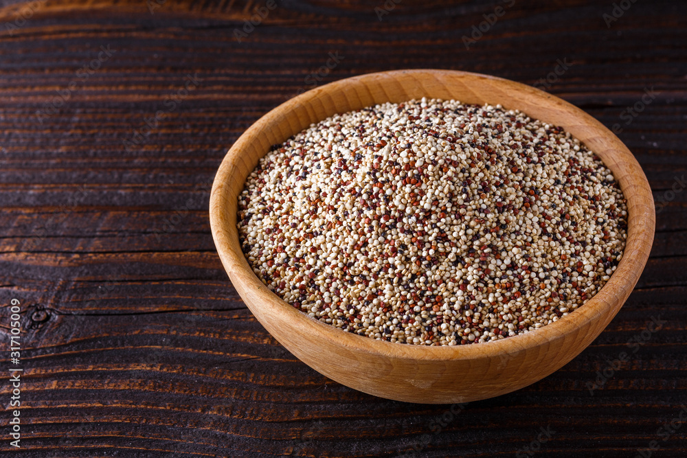 mix of quinoa grains on dark wooden rustic background mix of quinoa grains on dark wooden rustic background