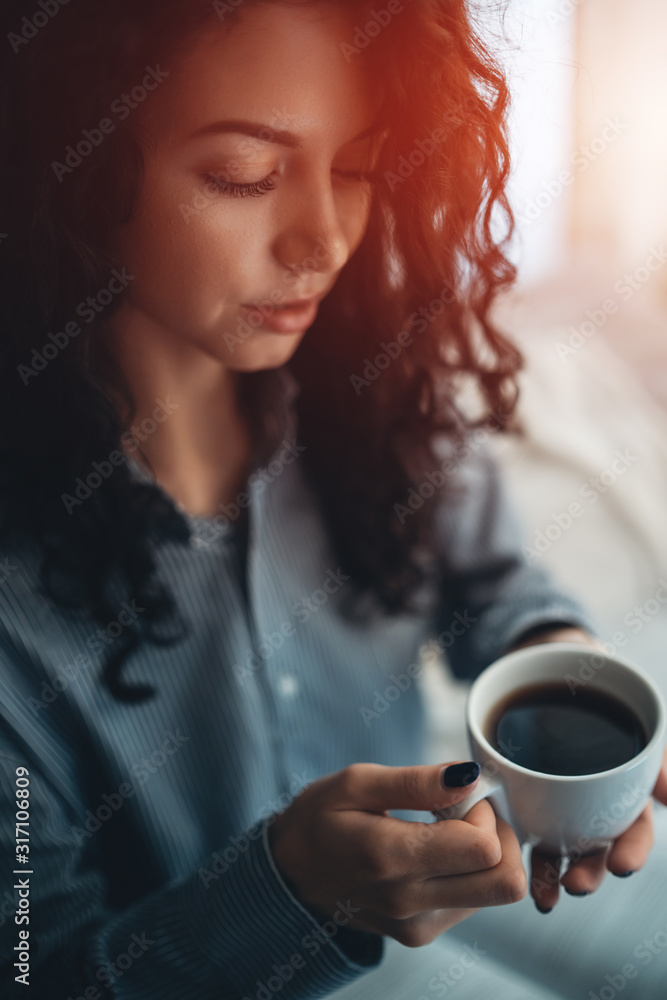 pretty brunette woman in morning bed with books and coffee pretty brunette woman in morning bed with books and coffee