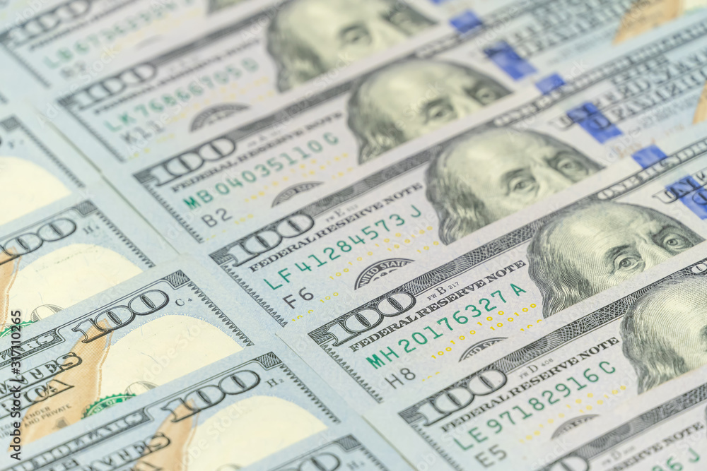Dollars stacked exactly next to each other as a background Dollars stacked exactly next to each other as a background