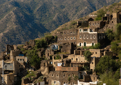 Multi-storey houses made of stones, Asir province, Rijal Alma, Saudi Arabia photo