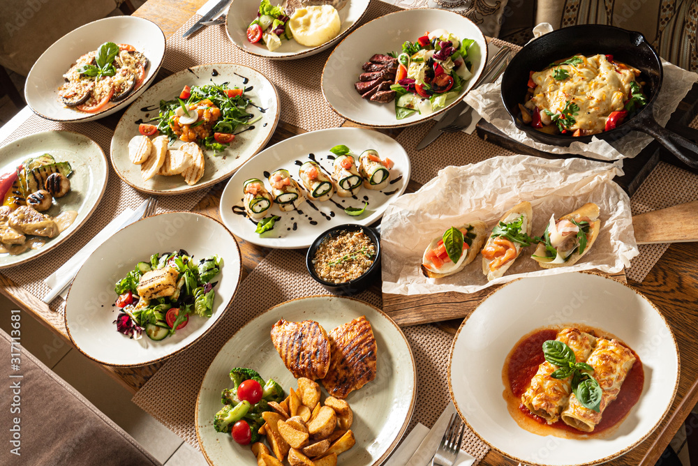 Christmas banquet with many dishes, top view Christmas banquet with many dishes, top view