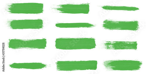 Set of green paint brushes. Beautiful green smears brushes