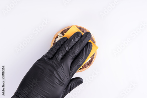  phased assembly of a hamburger on a white background15 photo