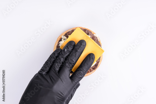  phased assembly of a hamburger on a white background14 photo