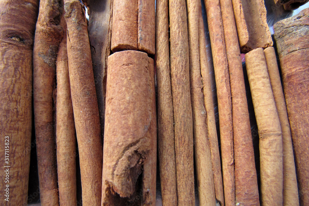 closeup cinnamon sticks texture background
