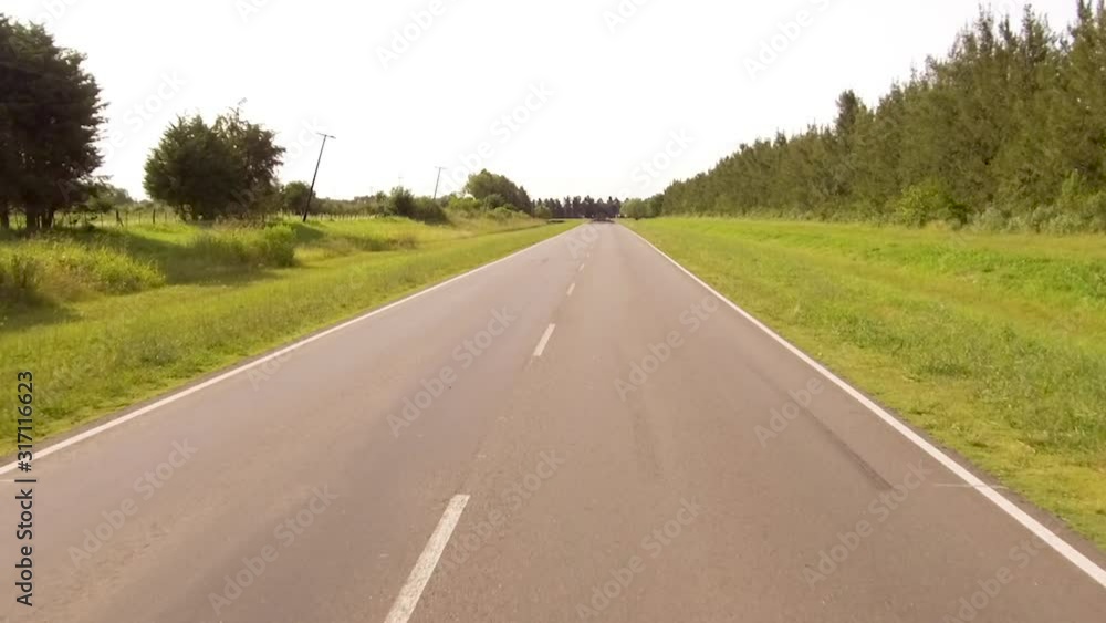 Driving Riding a Car bike on a Country side Road, valley � POV Plate - Point of view front � Flying camera sunset. Drone Driving Riding a Car bike on a Country side Road, valley � POV Plate - Point of view front � Flying camera sunset. Drone