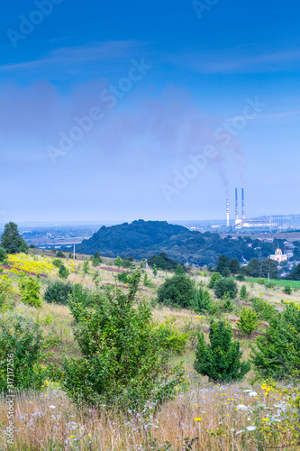 The largest air pollutant in western Ukraine is coal-fired power plant Burshtyn TES. 2 flue gas stacks 250 meters in height and one 180 emit 500 tons of harmful substances a day into the atmosphere. photo