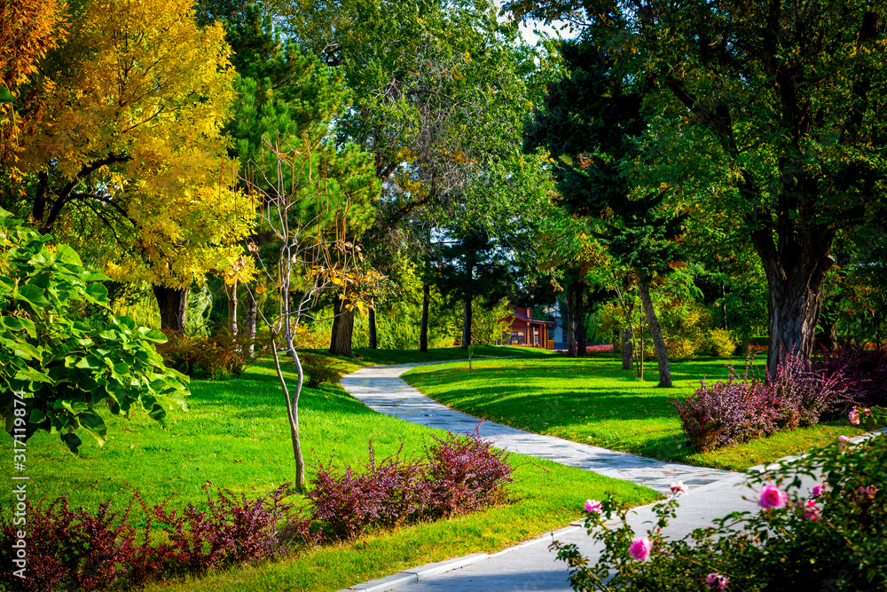 Flowerbeds, Grass Pathway and Ornamental Vase in a Formal Garden Flowerbeds, Grass Pathway and Ornamental Vase in a Formal Garden