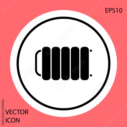 Black Heating radiator icon isolated on red background. White circle button. Vector Illustration