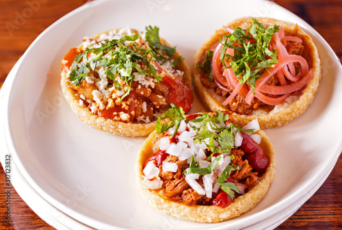 Mexican Entree of three Sopes with Various Toppings