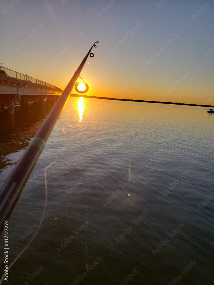 Fishing the lake at sunset
