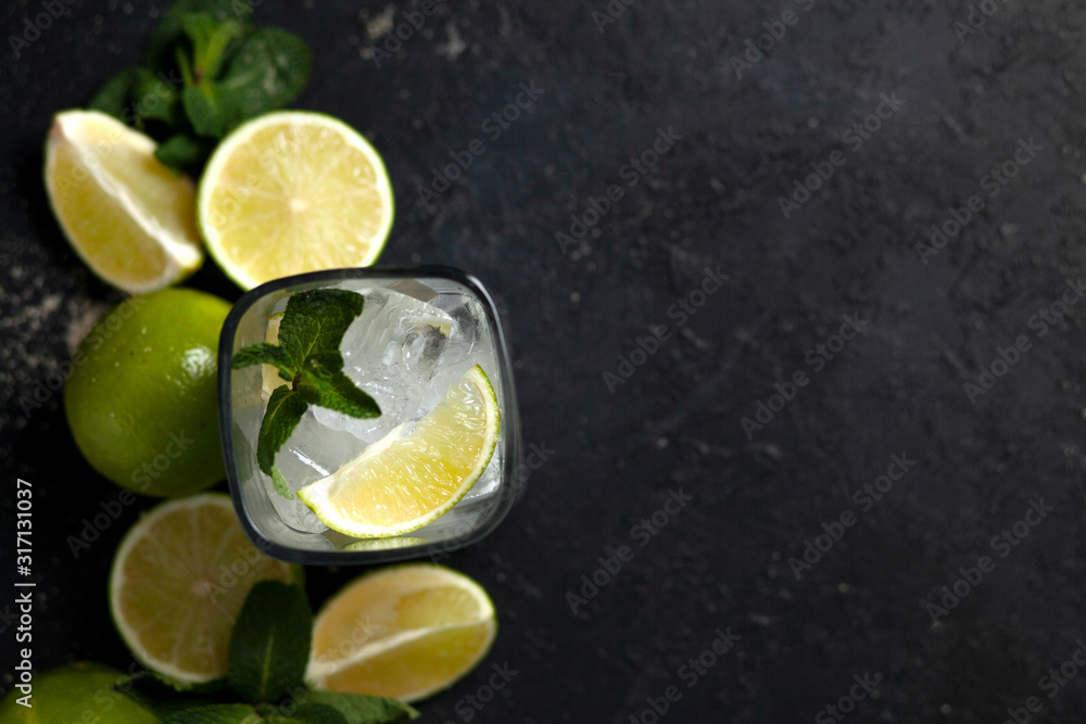 process of making homemade cocktail, flat with the ingredients for mojito on a black background, a refreshing summer cocktail process of making homemade cocktail, flat with the ingredients for mojito on a black background, a refreshing summer cocktail