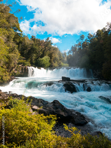 Fototapeta Naklejka Na Ścianę i Meble -  Waterfall of La Leona, in Huilo Huilo Biological Reserve, Los Ríos Region, southern Chile.