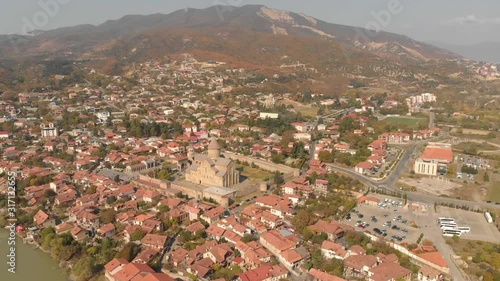 Wide slow Orbit around Mtskheta Georgia with the Samtavro Monastery in the center photo
