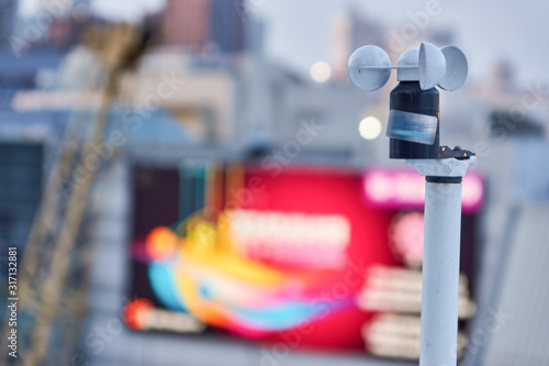 Cup anemometer. Indicator for airspeed and wind direction. Blurred city background, Moscow