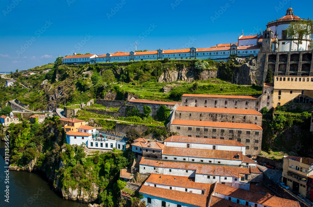 View of the Villa Nova de Gaia city on the banks of the Douro river in Portugal