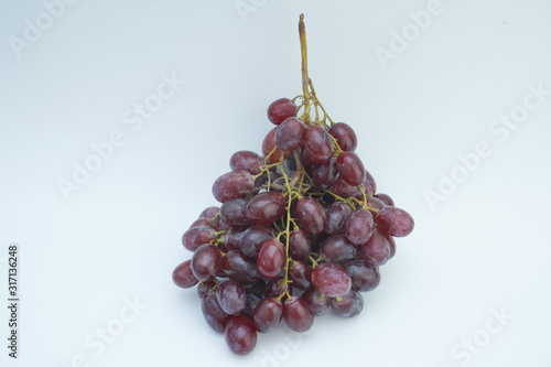 Fresh grapes on white background. photo