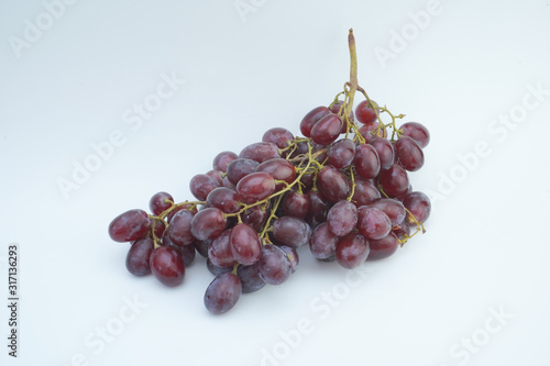 Fresh grapes on white background. photo