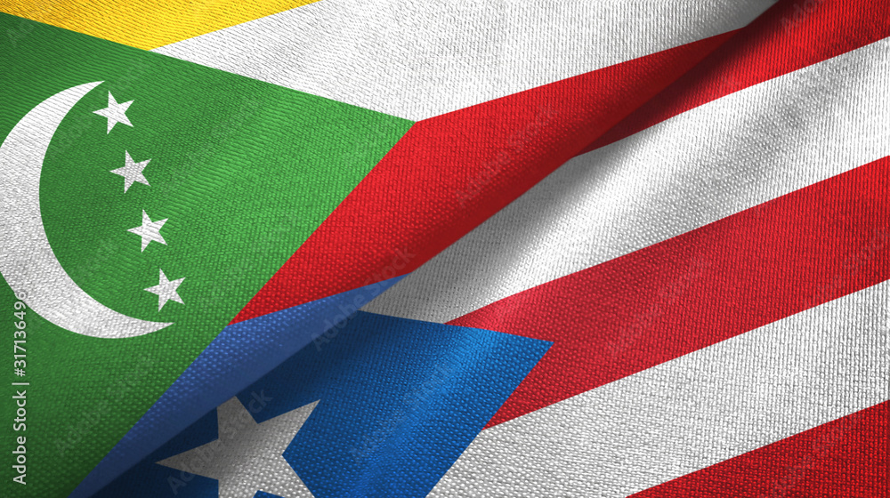 Fototapeta premium Komory i Portoryko dwie flagi tkaniny tekstylne, tekstura tkaniny