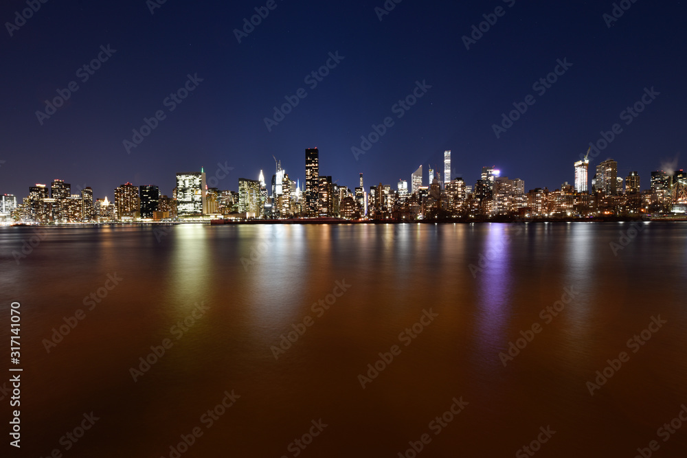 Manhattan night skyline from Queens
