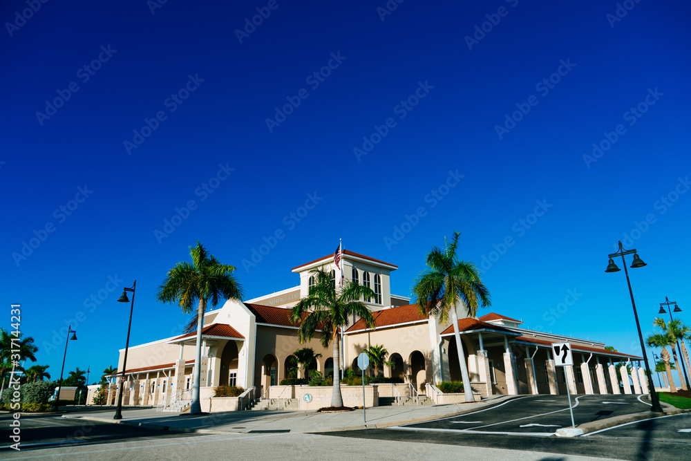 Punta Gorda, FL / USA - 12 25 2019: Punta Gorda city downtown building and blue sky