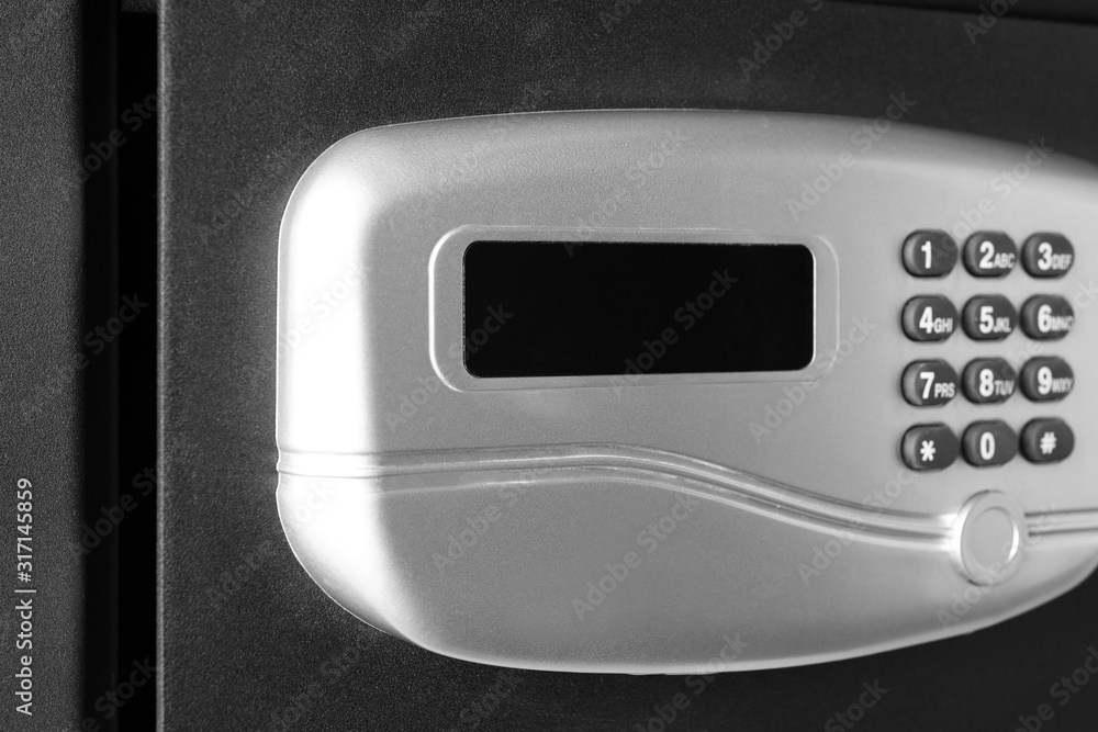 Black steel safe with electronic lock, closeup Black steel safe with electronic lock, closeup