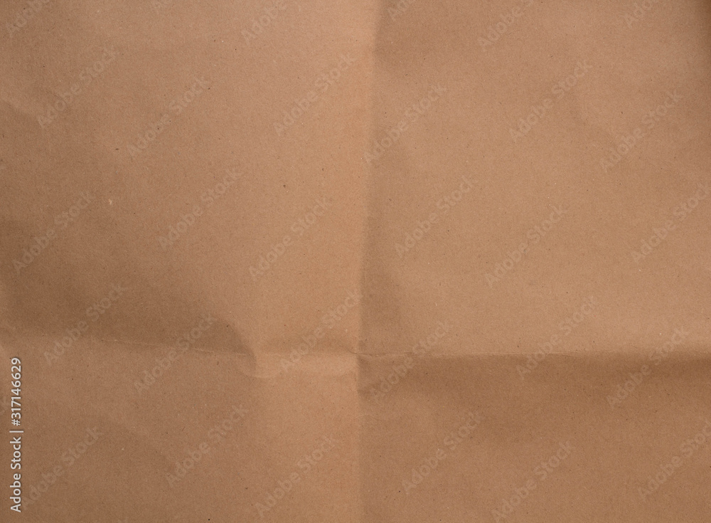 Naklejka premium Papel kraft doblado para envolver