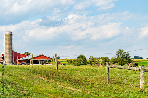 Amish country farm barn field agriculture in Lancaster, PA US