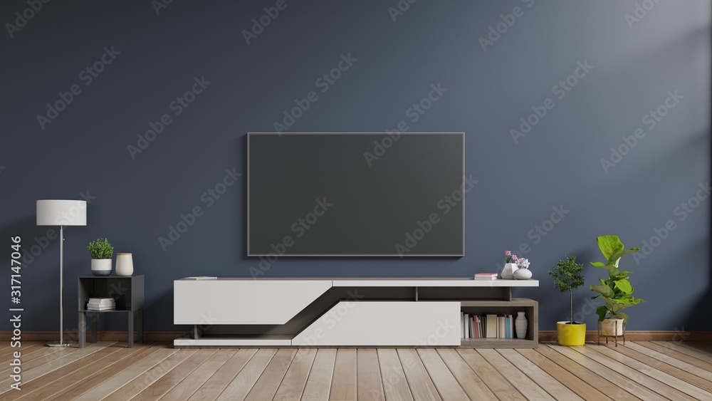 LED TV on the dark wall in living room,minimal design. LED TV on the dark wall in living room,minimal design.