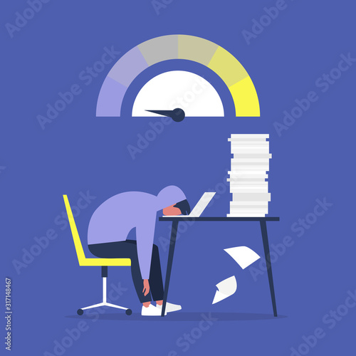 Professional burnout, Young exhausted male manager sitting at the desk in the office, Long working day, Millennials at work