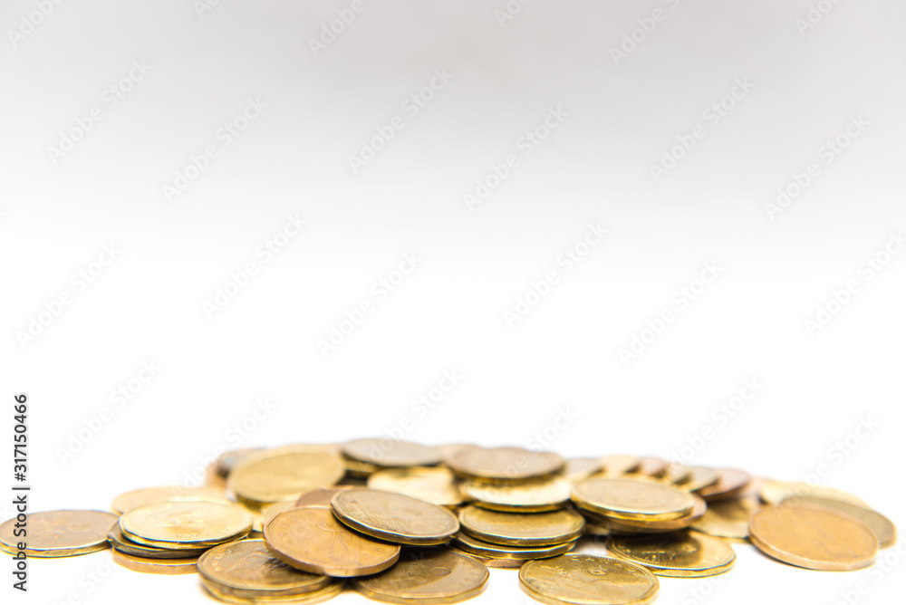 Canadian Dollar coins loonies isolated on white background with copy space. Canadian Dollar coins loonies isolated on white background with copy space.