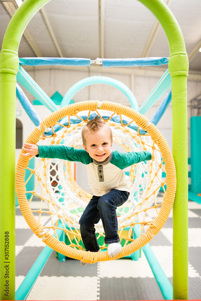 Happy Toddler Explores in jungle gym tunnel Happy Toddler Explores in jungle gym tunnel