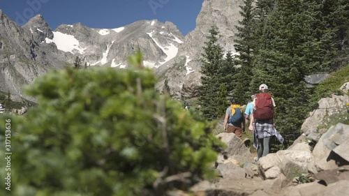 Group Backpackers Hike High Altitude in Colorado Rocky Mountains