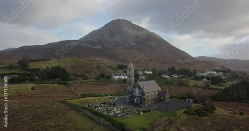 Aerial View of Irish Church with Erigal Mountain in the background, Ireland photo