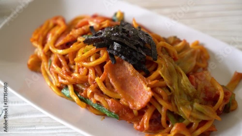 stir-fried noodles with Korean spicy sauce and vegetable photo