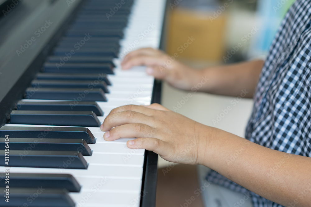 The Boys playing piano, Learning Piano The Boys playing piano, Learning Piano
