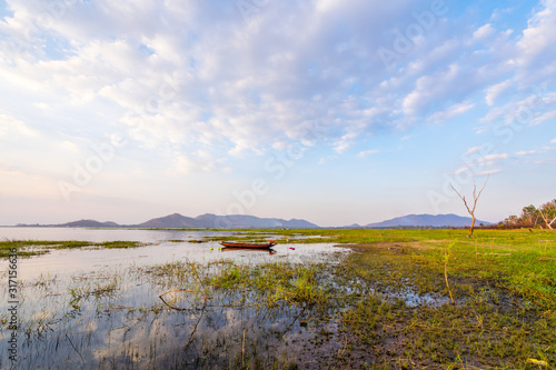 Fishing boat with sunset at Bang phra reservoir  sriracha chon buri   thailand