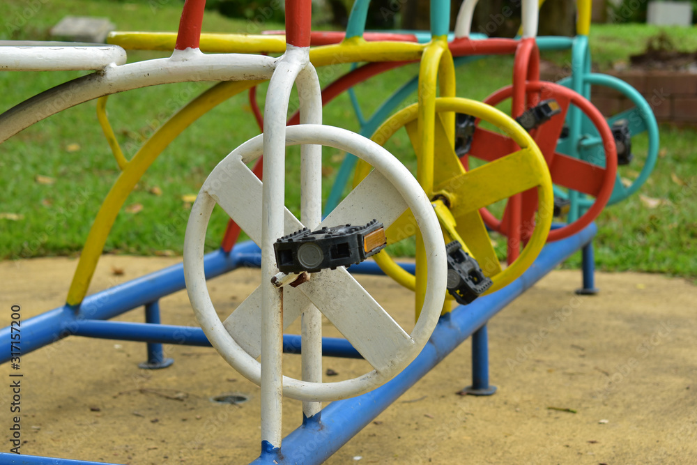 bicycle kid stand in outdoor playground