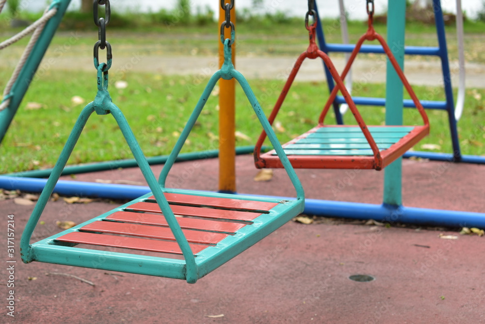 swing steel seat in playground for kid playing in outdoor park swing steel seat in playground for kid playing in outdoor park