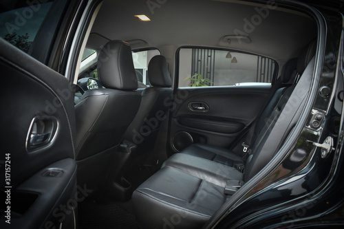 black leather of back seat interior inside modern vehicle car automobile