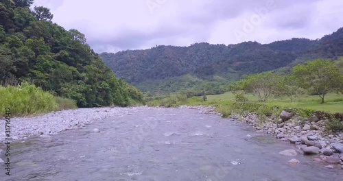 Aerial shot of the cristal water river  in the Orosi valley photo