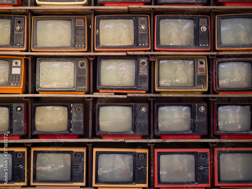 The Pattern wall of pile old retro TV bachground