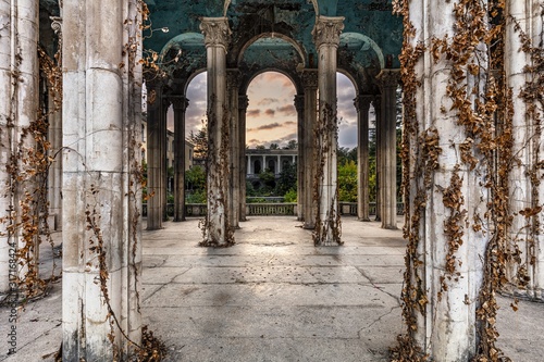 Historical Derelict Sanatorium Medea in Tskaltubo, Georgia during the sunset photo